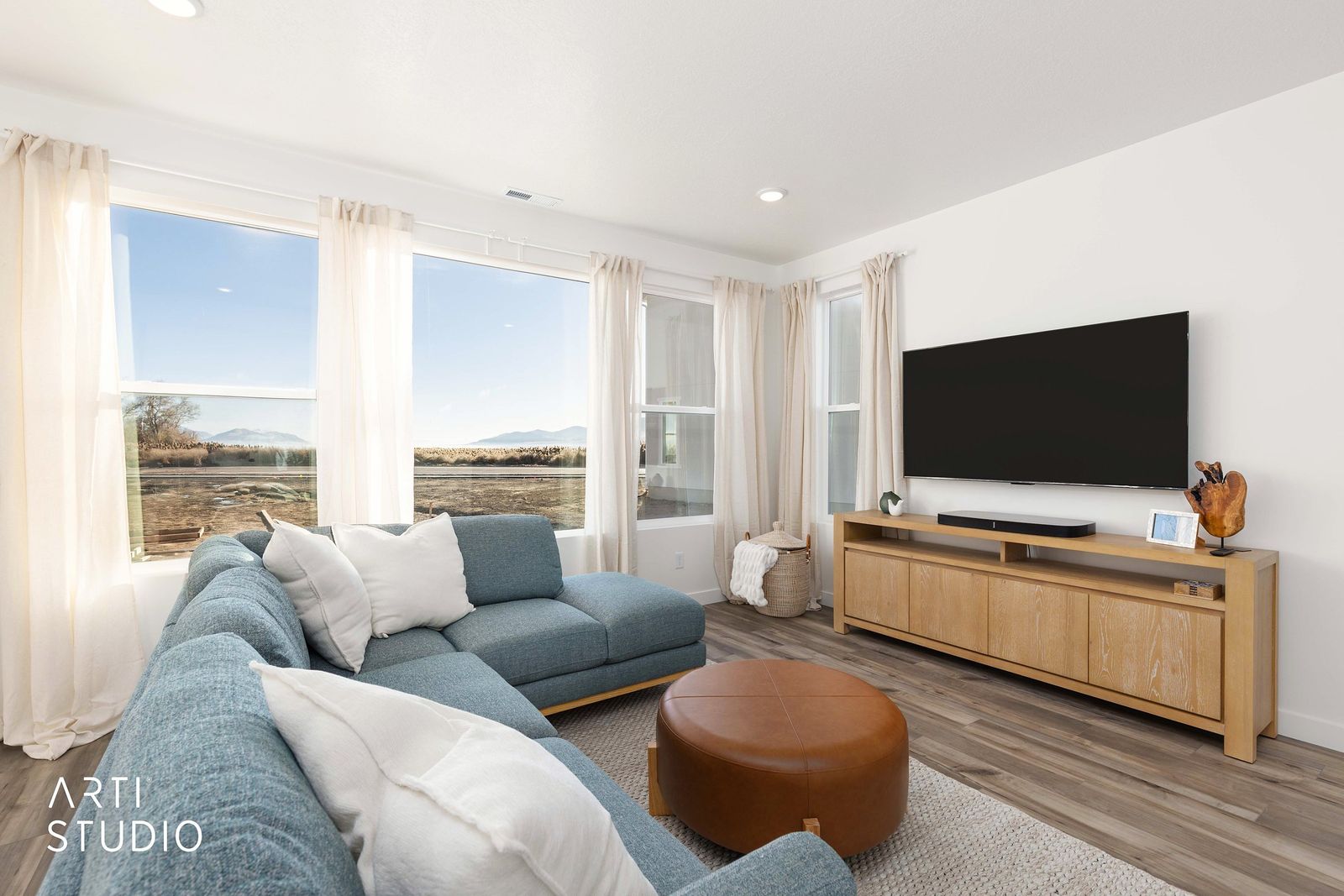 Living room seating with a view out to the water