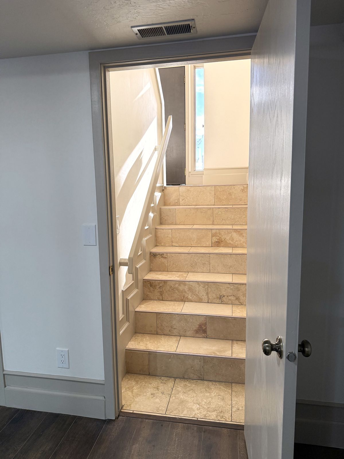Tiled stair with new painted trim