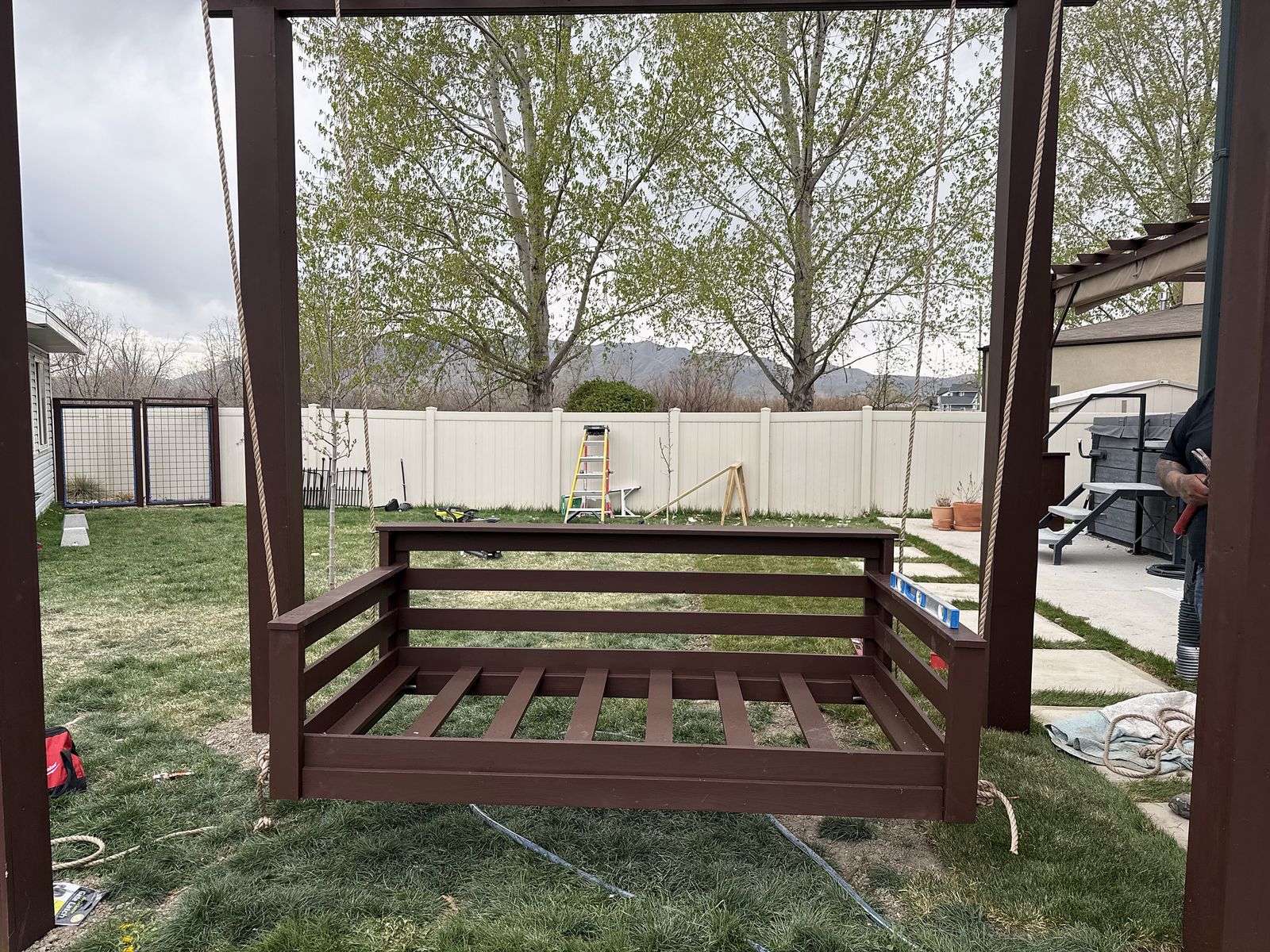 The swing bed hung under the new pergola before cushions were added